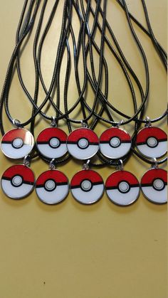 the necklaces have been made to look like pikachu's eyes on them