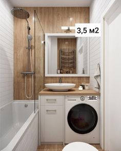 a bathroom with a washer and dryer in it