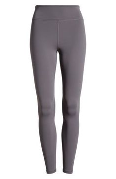 Work out or chill out in these stretchy leggings cut with a supportive wide waistband. 27" inseam; 7" leg opening; 9 1/2" front rise Pull-on style Hidden back waist pocket 75% nylon, 25% spandex Machine wash, tumble dry Imported Tight Mid-rise Athleisure Leggings, Go-dry Stretch Leggings, Mid-rise Stretch Leggings With Go-dry Technology, Stretch Go-dry Leggings, Comfort Stretch Go-dry Leggings, Full Length Tights For Pilates In Fall, Fall Pilates Full-length Tights, Fall Moisture-wicking High Stretch Leggings, Moisture-wicking High Stretch Leggings For Fall