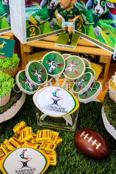 a football themed party with cupcakes and decorations