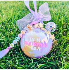 an ornament on the grass that says, i'm my birthday girl