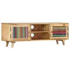 a wooden entertainment center with colored pencils in it