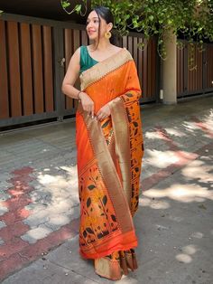 Discover exquisite craftsmanship with our orange banarasi paithani silk saree and matching saree blouse. Made from pure silk, this saree showcases the mastery of traditional Indian weaving techniques, resulting in a stunning and elegant design.
The highlight of this saree is the beautifully woven resham zari, which adds a touch of opulence and grandeur. The intricate 12-inch meenakari flower design at the border is a testament to the skill and artistry of our talented artisans.With a length of 5 Orange Banarasi Silk Pre-draped Saree For Diwali, Unstitched Orange Pre-draped Saree For Puja, Traditional Orange Art Silk Pre-draped Saree, Festive Orange Pre-draped Saree With Zari Weaving, Festive Orange Art Silk Pre-draped Saree, Traditional Orange Banarasi Silk Pre-draped Saree, Traditional Orange Pre-draped Saree With Zari Weaving, Traditional Orange Pre-draped Saree For Festive Occasions, Bollywood Orange Silk Pre-draped Saree