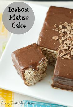 a cake with chocolate frosting and nuts on top is cut in half to make it look like an icebox matzo cake