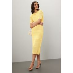 Yellow knit (65% Viscose, 35% Nylon). Casual dress. Short sleeves. Crew neck. Pull-on. 45" from shoulder to hemline. Imported. Spring Yellow Knit Dress, Yellow Ribbed Dress, Yellow Solid Color V-neck Midi Dress, Yellow Knit Dress, Luxury Knit Midi Dress With V-neck, Yellow Ruched V-neck Midi Dress, Yellow Knit, Office Casual, Rent The Runway