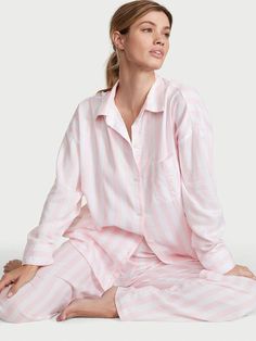 Crafted in an ultra-soft modal-cotton blend, these classic PJs are what dreams are made of. Oversized fit Long sleeve, button-front top hits at hips Chest pocket Pants with elastic waist Soft, plant-derived modal fibers, sourced from sustainably managed forests Machine wash Imported Vs Pajamas, Cute Pjs, Lingerie Catalog, Victoria Secret Pajamas, Pink Pajamas, Pajamas Sets, Cute Pajamas, Women Nightwear, Short Pajama Set