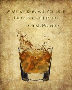 a glass filled with ice sitting on top of a table next to a sign that says, what whiskey will not be there is nocure for irish prove