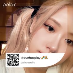 a girl with long blonde hair is looking at the camera and has a qr code in front of her