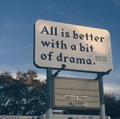 a sign that says, all is better with a bit of drama