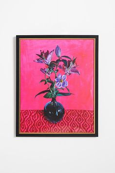 a painting of purple flowers in a black vase on a red and pink tablecloth