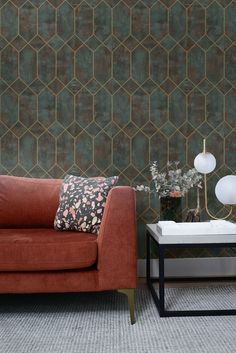 a living room scene with focus on the couch and coffee table in the foreground