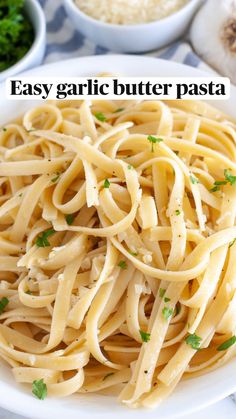 easy garlic butter pasta in a white bowl with parsley on top