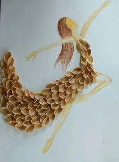 a drawing of a woman made out of nuts