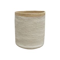 a large white and beige basket with rope on the bottom, in front of a white background