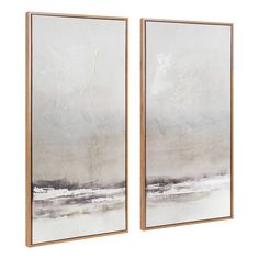 two framed art pieces with grey and white paint on them, one is in the shape of an ocean scene