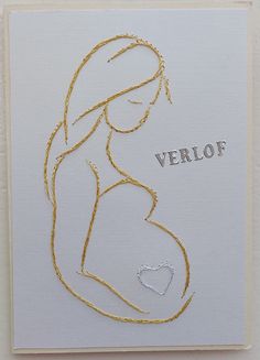 a pregnant woman's belly with the word verlop written on it in gold foil