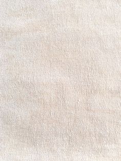 a close up view of a white fabric texture