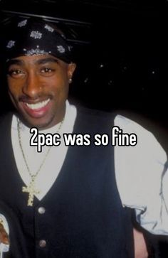 a man wearing a black vest and white shirt with the words 2pac was so fine