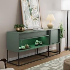 a living room scene with focus on the sideboard and vases sitting on it