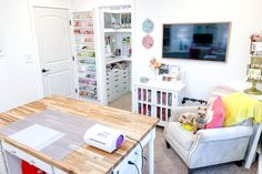 a living room filled with furniture and lots of clutter