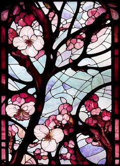 a stained glass window with pink flowers on it