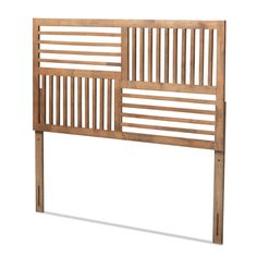 a wooden headboard with slatted design