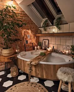 a bathroom with a large jacuzzi tub next to a table and stools