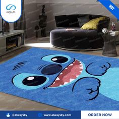 the rug is designed to look like a cartoon character with big teeth and large eyes