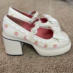 Dolls Kill & Strawberry Shortcake Spunky Cutie Mary Janes Size 9 Excellent Preowned Condition (Small Berry Balls On The Toes Have Been Removed, Flaws On Bows - See Last Photo) 3.5” Chunky Heel, Mary Jane Style Shoe, Scalloped Edge Details, Vegan Leather, Platform Rounded Toe, White With Pink Strawberries Painted On, Bows On Toes, Limited Edition Rare Collab, Girly Cute Femme Feminine Coquette Make Me An Offer! Smoke Free Home! Coquette Mary Janes, Shoe Inspo Heels, Marry Janes Shoe, Quirky Shoes, Pink Strawberries, Small Heels, Cc Shoes