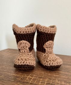 "Adorable Crocheted Baby Cowboy Booties.  You can pair these cozy booties with any outfit.  They will keep your baby's feet nice and warm. Approximately 3.25\" long and 1 1/2\" wide Hand made from a smoke free home Washing Instructions  ~Machine wash warm/gentle cycle and set out to dry ~100% Acrylic yarn" Baby Boy Crochet Boots, Crochet Boots For Teddy, Knit Baby Cowboy Boots, Baby Cowboy Boots Crochet Pattern Free, Crochet Baby Cowboy Boots, Baby Cowboy Boots, Fall Wraps, Crochet Baby Boots, Cowboy Baby