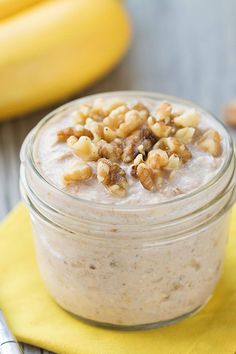 a jar filled with oatmeal sitting on top of a yellow napkin