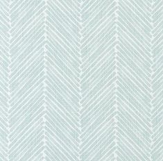 a blue and white wallpaper with an arrow pattern