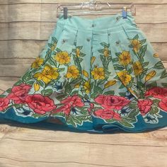 *Skirt Fabric:95% Cotton 5% Spandex *Skirt Color: Blue/Teal Floral Design *Skirt Closure:Zipper(Back) *Skirt Features: 1) Waistline Is Not Elastic 2) Pleated Design 3) Hidden Zipper In The Back 4) Vibrant Pattern 5) Flared A-Line Silhouette 6) Skirt Is Little Elastic 7) Unlined *Package Contents:1*Skirt(No Accessories Included) Light Blue Stretch Mini Skirt For Spring, Blue Flared Skirt For Spring, Light Blue Stretch Skirt For Summer, Turquoise Fitted Bottoms For Spring, Fitted Turquoise Bottoms For Spring, Light Blue Stretch Skirt For Spring, Spring Blue Pleated Skirt Bottoms, Blue Full Pleated Skirt For Spring, Light Blue Stretch Skort For Spring