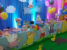 a peppa pig themed birthday party with balloons and decorations