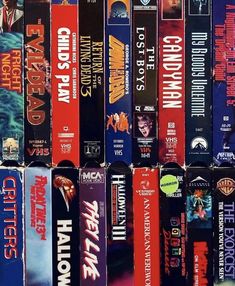 a collection of vhs - roms are stacked on top of each other in rows