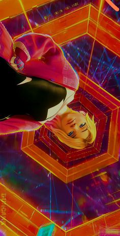 an animated image of a woman with blonde hair and blue eyes standing in front of colorful cubes