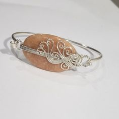 Beautiful Unique Natural Handmade Orange Aventurine Gemstone 925 Silver Wire Wrapped Bangle Bracelet- Ed30361 The Item You See Is The Exact Piece You Will Receive-Excellent Quality & Design~ Brand New-Unique-Beautiful, Natural, Large, Orange Aventurine Gemstone-925 Sterling Silver Stamped-Bangle-Wire Wrapped-Detailed Design-Handmade Please See Photos For Shape/Curves/Condition/Colors/Texture/Style/Design/Engraving I Want You To Have The Very Best Shopping Experience, Please Review Item Photos Wire Wrapped Jewelry Bracelets, Wire Wrapped Gemstone Jewelry, Wrapped Bracelets, Gemstone Bangle Bracelets, Handmade Bead Jewellery, Wire Ideas, Orange Aventurine, Aventurine Bracelet, Wire Jewelry Rings