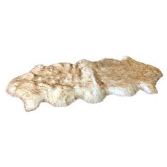 an animal skin rug is shown on a white background