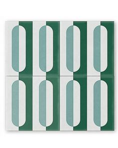 four pieces of green and white paper with rounded shapes on each side, one in the middle