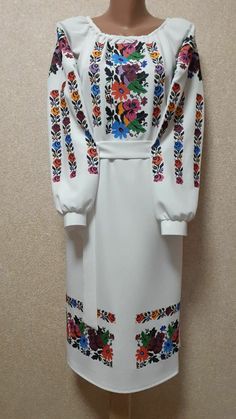 Ukrainian Romanian Hungrian Embroidered dress for women Sorochka Vyshyvanka Tradition Size S-XXXL Ukrainian Embroidered dress for women (vyshyvanka) with traditional embroidery flowers.  Very beautiful embroidered blouse with long sleeves for women.  Material: linen, beautiful natural fabric. Beautiful and original gifts. Size  XS, S, M, L, XL, XXL, XXXL When ordering please tell me the circumference of the chest, waist and hips.  We will choose the right size for you! CHARACTERISTICS Made in Uk Slavic Clothing, Embroidered Products, Ukrainian Wedding, Sleeves For Women, Ukrainian Style, Ukrainian Clothing, Ukrainian Dress, Blouse With Long Sleeves, Traditional Embroidery