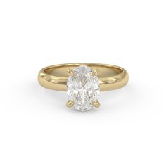 an oval cut diamond engagement ring in yellow gold