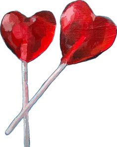 two heart shaped lollipops on a stick