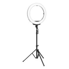 a white ring light on a tripod