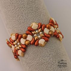 a close up of a bracelet on a mannequin