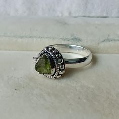 WELCOME AT KINGMANJEWELRYCo Peridot Ring , Raw Handmade Ring , 925 Sterling Silver Ring , Statement Ring , Christmas Gifts , Peridot Gemstone Ring , Gifts For Mother  METAL = 925 STERLING SILVER  GEMSTONE = RAW PERIDOT GEMSTONE SHIPPING =  FREE SHIPPING WORLDWIDE PACKING = All Items come in a pretty Box OCCASION = birthday gift , anniversary Gift , Wedding Gift , valentine gift, Christmas gift , Thank You Very Much For Visiting My Store Please Give Me Good Review Raw Peridot, Gifts For Mother, Ring Gifts, Gift Valentine, Pretty Box, Peridot Gemstone, Peridot Ring, Valentine Gift, Gift Wedding