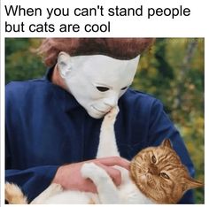 a man holding a cat with the caption when you can't stand people but cats are cool