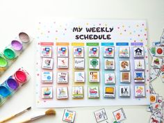 a table topped with lots of different types of cards and paintbrushes next to each other