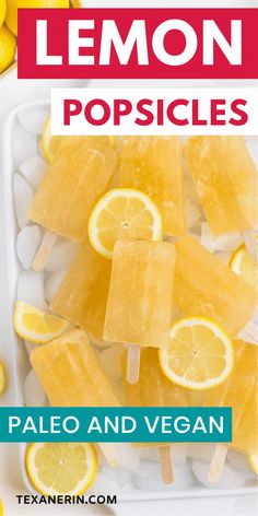 lemon popsicles on a plate with ice cubes and sliced lemons in the background