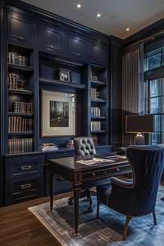 a home office with dark blue walls and built in bookshelves, leather chair, and desk