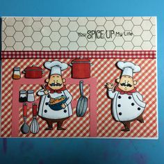 a card with two chefs cooking on the stove and one holding a spatula in his hand